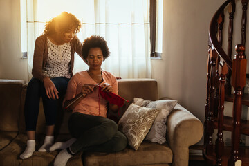 Obraz premium Mother and daughter enjoying at home