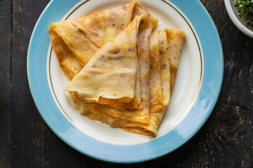 crepes breakfast thin pancakes sweet dessert flat cake Shrovetide snack healthy meal top view copy space for text food background rustic