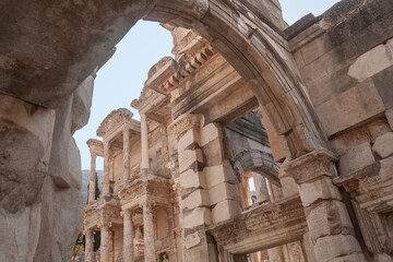 The Celsus Library in Ephesus - Selcuk (Izmir), Turkey. Ruins of ancient city. Beautiful facade of an old building of an ancient civilization. Seven Wonders of the World.