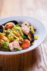 Pasta with seafood. Pasta with mussels and basil. Fresh Seafood fresh homemade pasta with mussels and parsley. Fresh Italian food. Mediterranean fresh sea food dish. Beautiful plate. fine dish