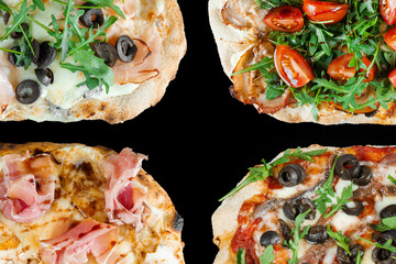 Pinsa romana gourmet italian cuisine on black background. Scrocchiarella traditional dish. Food...