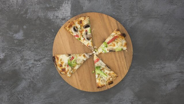Stop Motion Animation of Vegetable Pizza Being Eaten