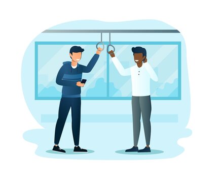 people riding subway train, holding handles