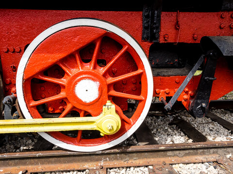 Close up image of carriage wheels from an old fashioned steam train