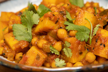 A bowl of the delicious Indian dish Chana Masala made from chickpeas and potatoes