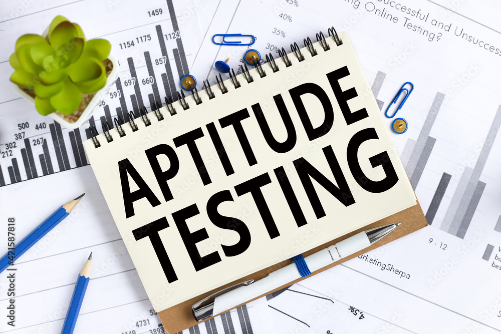 Poster aptitude testing. text on white notepad paper on light background.