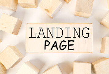 landing page. text on a piece of wood. on a white background