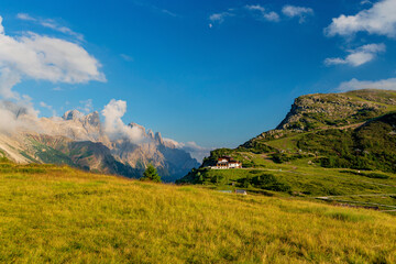 Very beautiful view of the evening mountains Pale di San Martino village with Dolomite peaks in Val di Primiero Noana of Trentino Alto-Adige