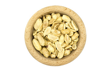 Salted peanuts in wooden bowl isolated on white background top view