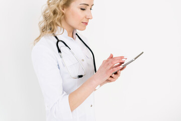 Doctor in white uniform against white background