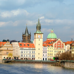 Fototapeta na wymiar Historical buildings in Prague from across the river u