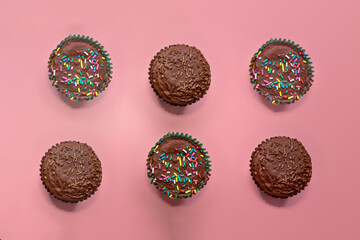 Chocolate baked cupcakes with colorful confectionery