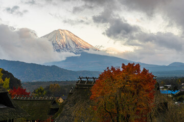 Views of the peak of Mt Fuji covered in snow as seen from the historical town of Iyashinosato