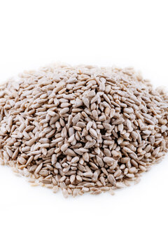 Top view of sunflower seeds. Peeled sunflower kernels. Sunflower seeds, peeled, kernels isolated on white background.