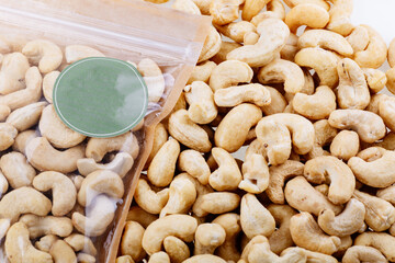 Cashew nut. Raw cashew nut isolated on white background. Heap of cashew nut on white background.