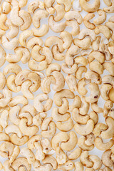 Background of cashew nut. Cashew nut. Raw cashew nut isolated on white background. Heap of cashew nut on white background.
