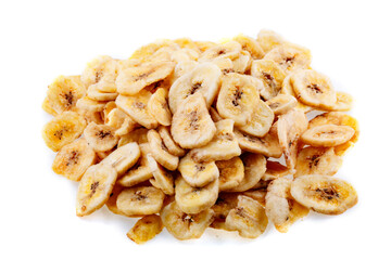 Dried bananas. Banana chips, dehydrated slices of fresh ripe bananas as food background.