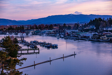 USA, Washington State, La Conner. Swinomish Channel with Mt. Baker in the background.