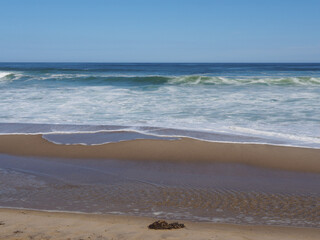 Tranquil scene of waves breaking in the coast in the Atlantic ocean
