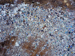 Aerial top view photo of large garbage pile at solid waste landfill