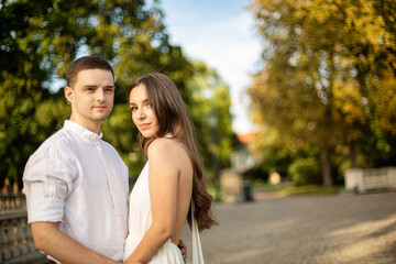 Naklejka premium Young white couple in park