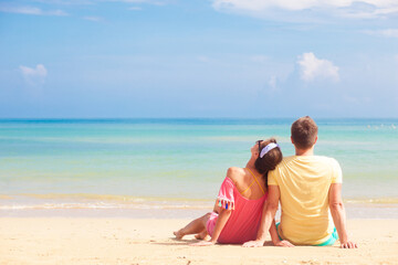 Fototapeta premium happy young couple lying and having fun on a tropical beach