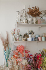Bright trendy composition of dried flowers, home decor, a long-lasting gift of flowers and herbs