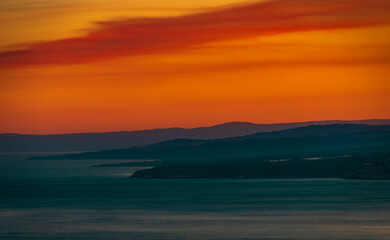 Fototapeta na wymiar Sunset over the sea. Scene from 