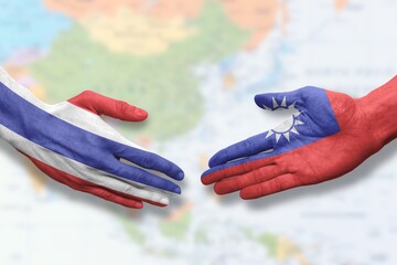 Thailand and Taiwan - Flag handshake symbolizing partnership and cooperation