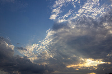 Fototapeta na wymiar clouds and sun