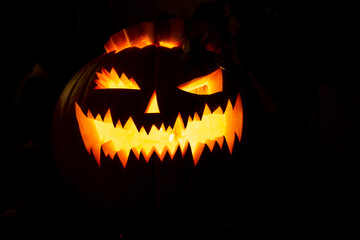 Halloween pumpkin with eyes glowing