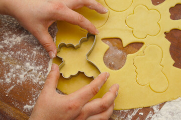 woman bakes cookies at easter time