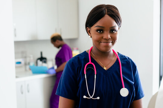 Portrait of Black female nurse with scrubs and stethoscope