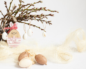 easter eggs on a willow and bunny