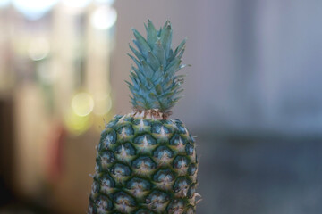 Pineapple and colorful background. Selective focus.