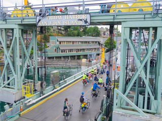 WA, San Juan Island, Passengers departing ferry at Friday Harbor © Danita Delimont