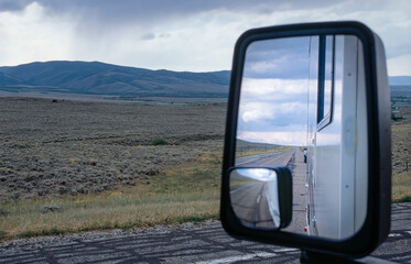 Colorado Highway in the rearview mirror, USA