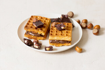 Chocolate spread with homemade waffles. Sweet breakfast 