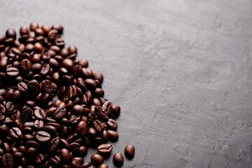 Roasted coffee beans, top view of coffee beans. Roasted coffee beans background