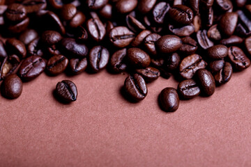 Roasted coffee beans, top view of coffee beans. Roasted coffee beans background