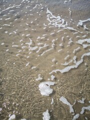clear sea water and sand at the beach