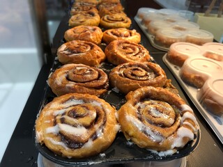 Rows of cinnamon bread at a breakfast buffet section