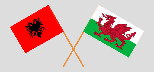 Crossed flags of Albania and Wales. Official colors. Correct proportion