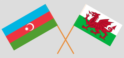 Crossed flags of Azerbaijan and Wales. Official colors. Correct proportion