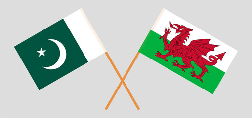 Crossed flags of Pakistan and Wales. Official colors. Correct proportion