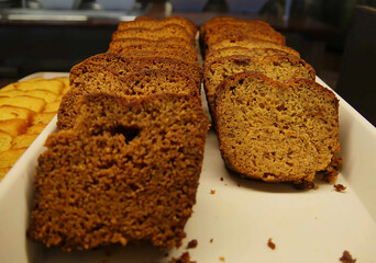 Banana bread slices in a white tray