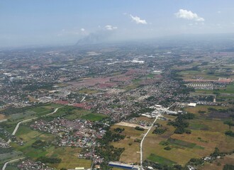 Fototapeta na wymiar Aerial view of Manila, Philippines, seen from the window of an airplane.