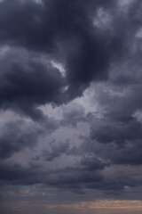 Epic Dramatic Storm sky with dark grey cumulus clouds background texture, thunderstorm