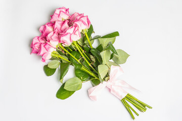 A bouquet of gentle pink roses isolated on white background