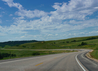 Fototapeta na wymiar Scenic winding road and beautiful landscape in Wyoming, USA..